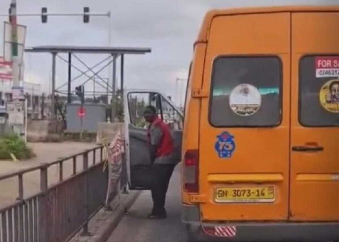 Police arrest driver captured in viral video urinating on the road