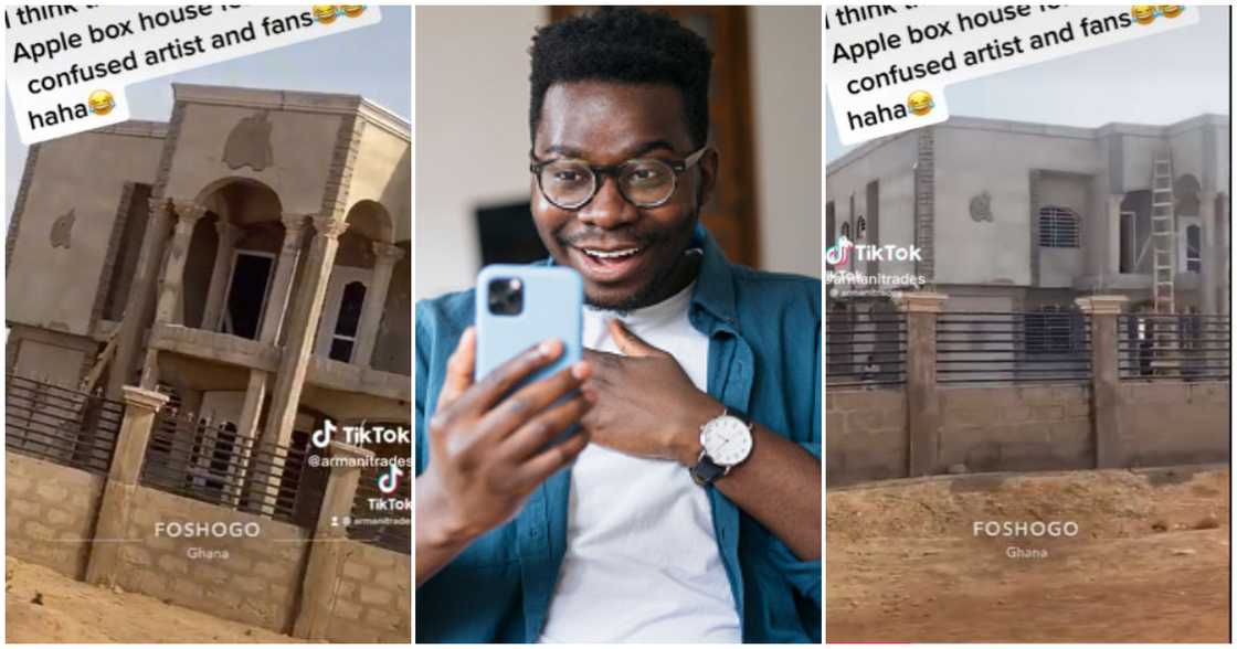 An amused man and an unpainted building An amused man and an unpainted building