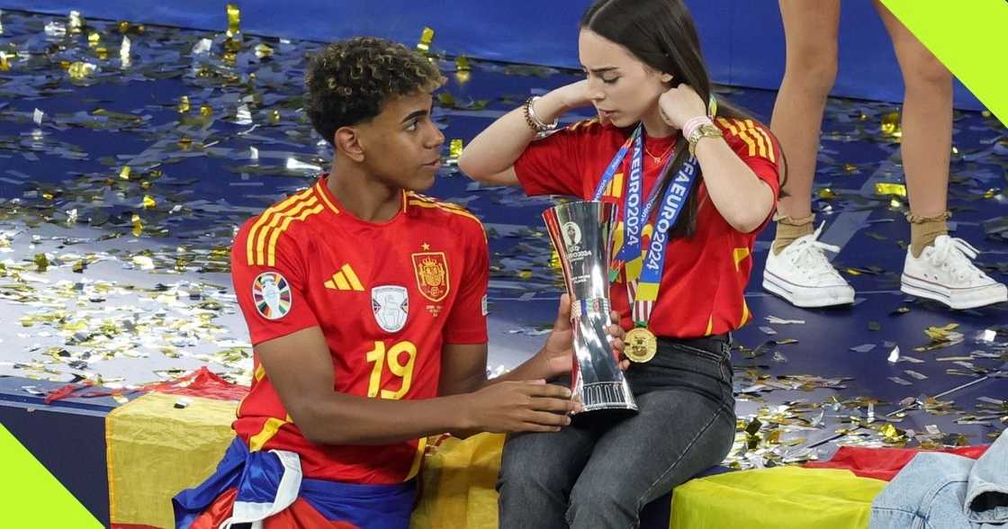 Lamine Yamal celebrates Euro 2024 win with his girlfriend. Lamine Yamal celebrates Euro 2024 win with his girlfriend.
