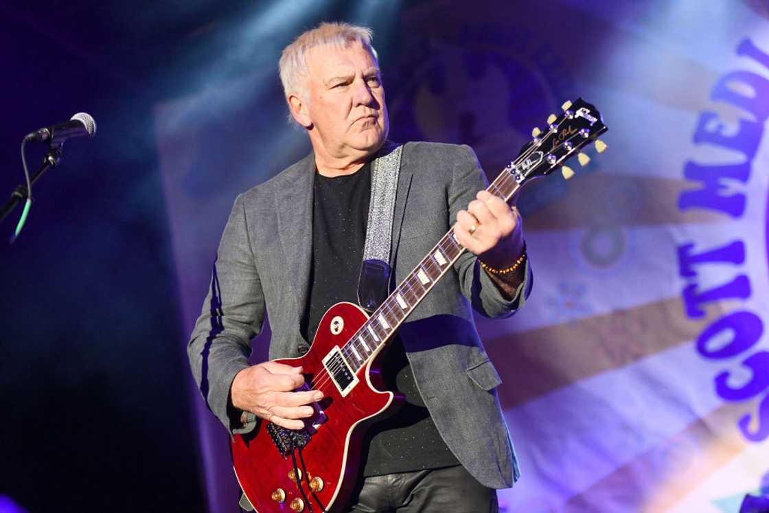 Rock and Roll Hall of Fame member Alex Lifeson performs onstage Rock and Roll Hall of Fame member Alex Lifeson performs onstage