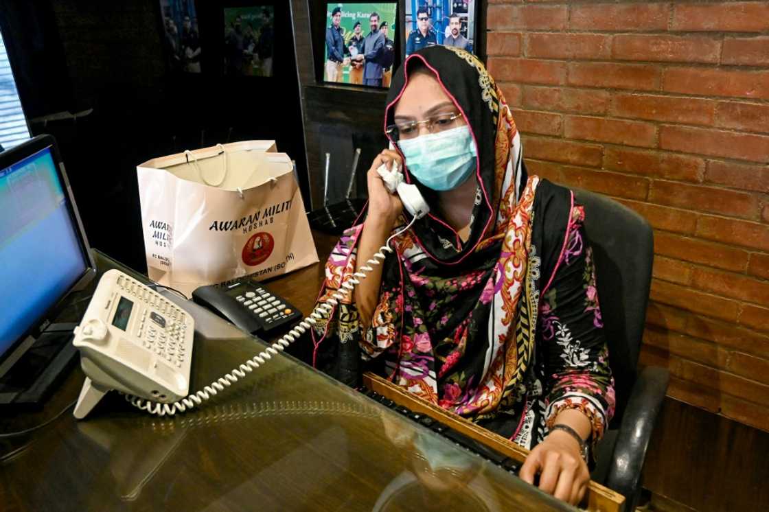 Hina Saleem works as a telephone operator in a leather factory in Korangi, Karachi's largest industrial area