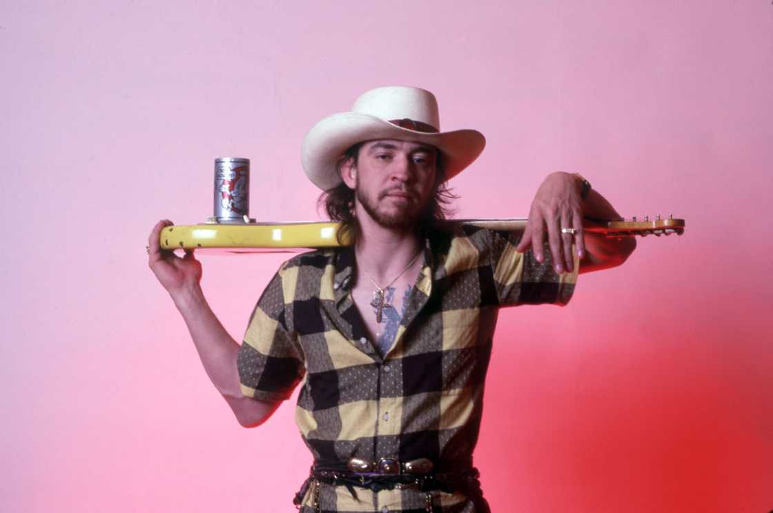 American singer, songwriter, and blues-rock guitar great Stevie Ray Vaughan poses backstage at the Meadow Brook Music Festival in Rochester Hills, Michigan. American singer, songwriter, and blues-rock guitar great Stevie Ray Vaughan poses backstage at the Meadow Brook Music Festival in Rochester Hills, Michigan.