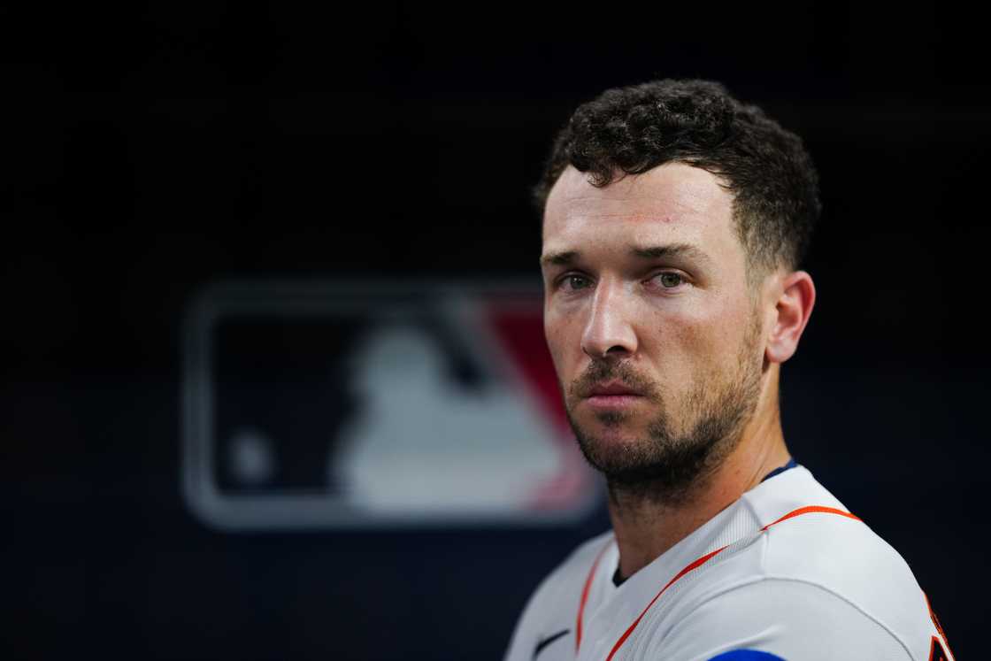 Alex Bregman looks on from the dugout during batting practice before Game 1