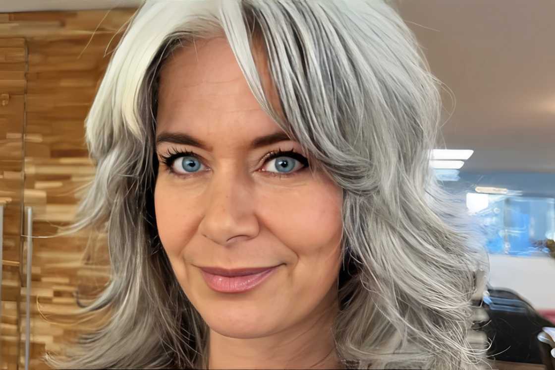 A side-parted iced midi shag with curtain style A side-parted iced midi shag with curtain style