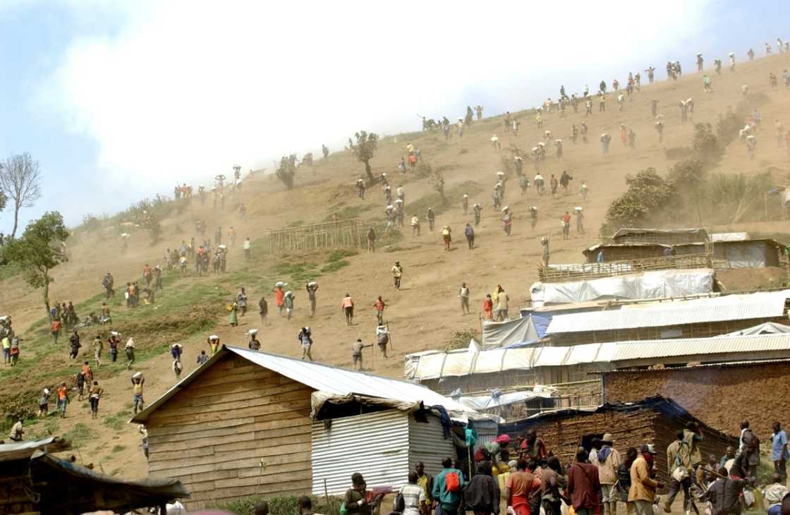 Workers at a coltan mine near Rubaya in eastern DRC, a region now under M23 control Workers at a coltan mine near Rubaya in eastern DRC, a region now under M23 control
