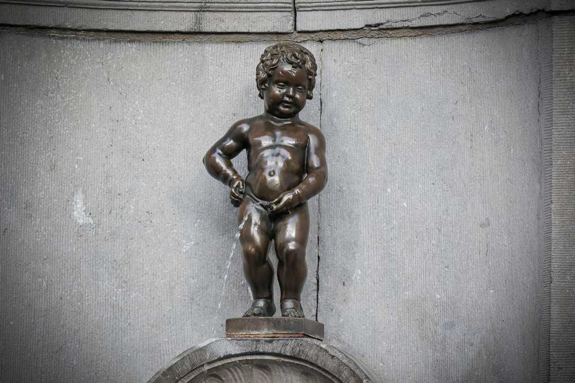 The Manneken Pis or le Petit Julien statue in Brussels, Belgium. The Manneken Pis or le Petit Julien statue in Brussels, Belgium.