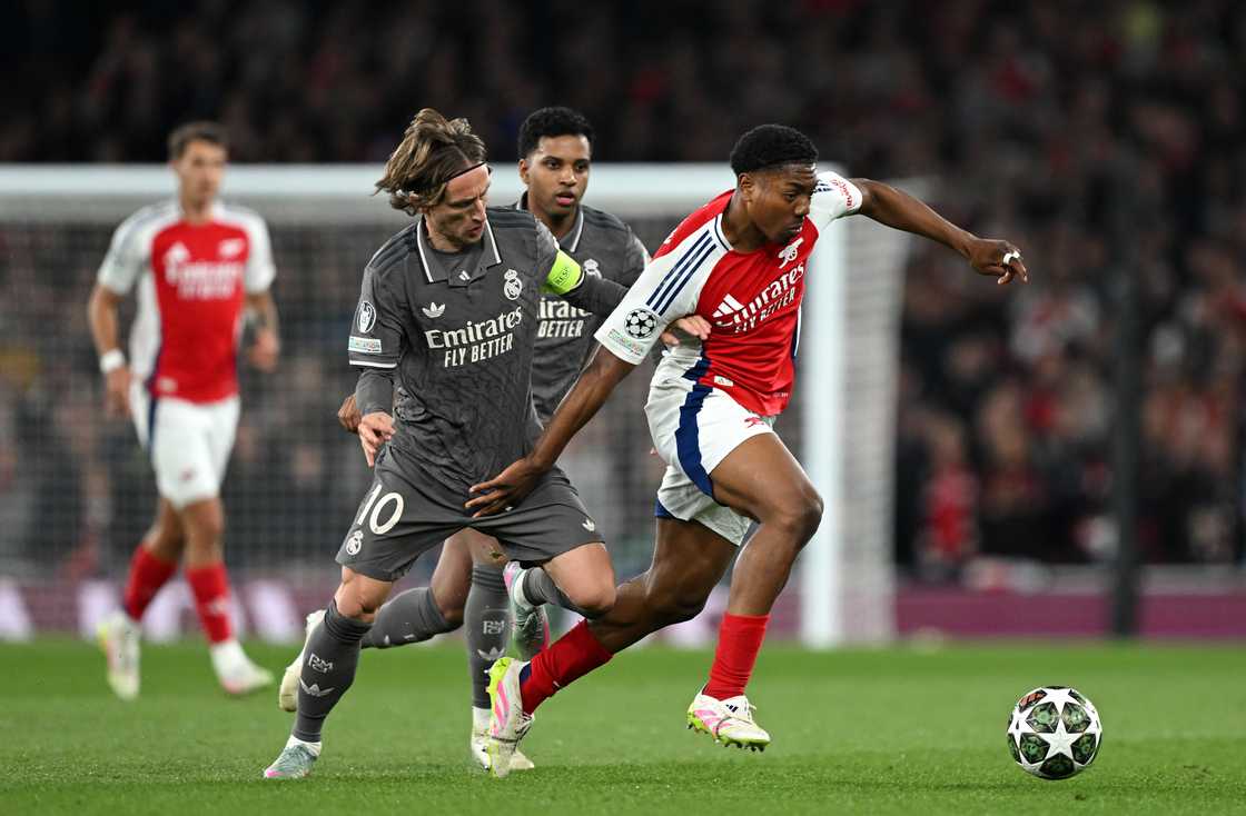 Myles Lewis-Skelly of Arsenal is challenged by Luka Modric of Real Madrid during the UEFA Champions League 2024/25 Quarter Final First Leg match between Arsenal FC and Real Madrid C.F. at Emirates Stadium on April 08, 2025 in London, England Myles Lewis-Skelly of Arsenal is challenged by Luka Modric of Real Madrid during the UEFA Champions League 2024/25 Quarter Final First Leg match between Arsenal FC and Real Madrid C.F. at Emirates Stadium on April 08, 2025 in London, England