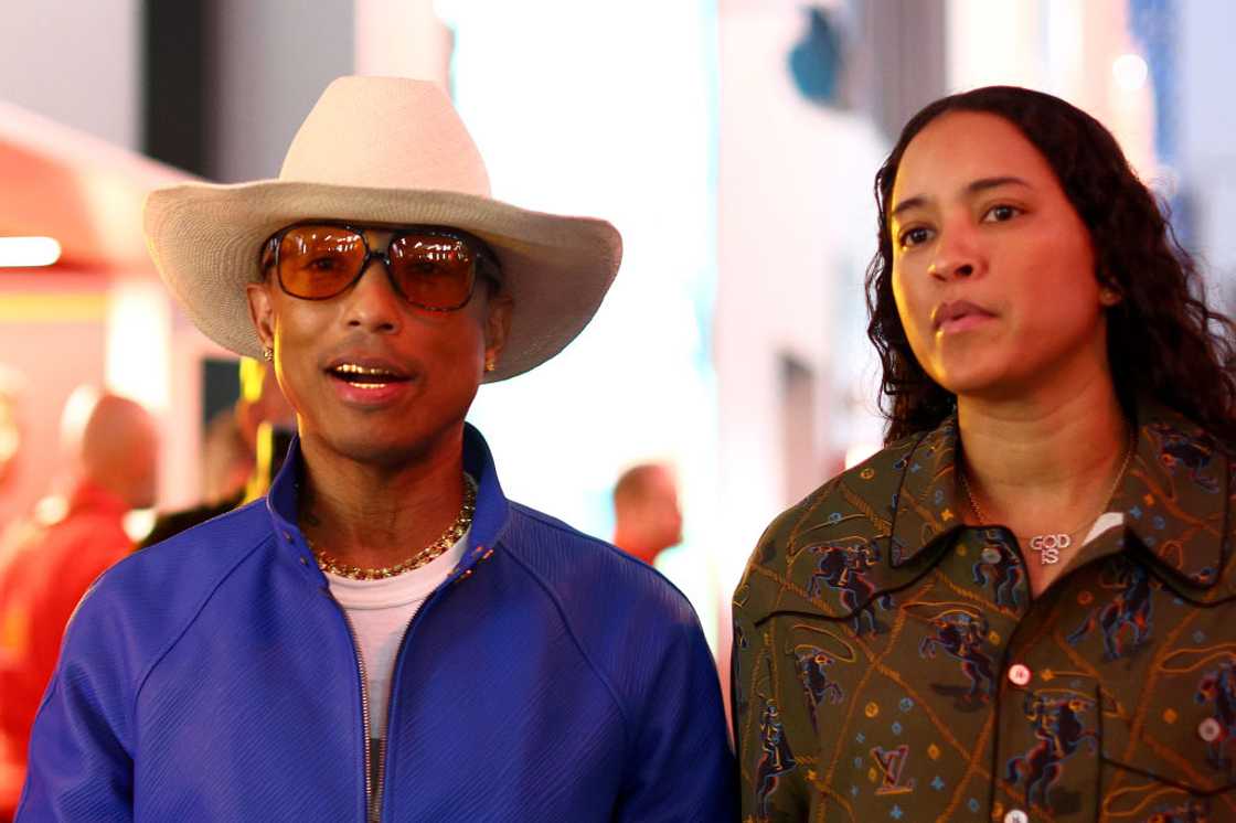 Pharell Williams and his wife Helen during a Grand Prix of South Arabia Pharell Williams and his wife Helen during a Grand Prix of South Arabia