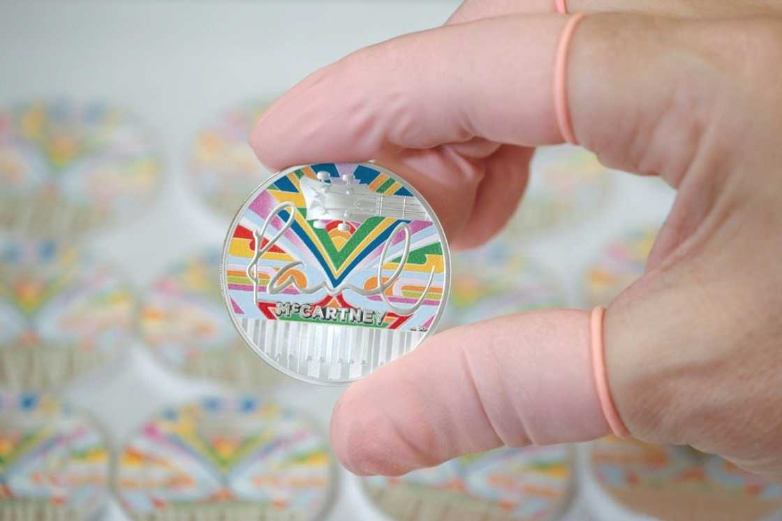 The coin's design includes the psychedelic 'magic piano' featured in the 1967 Magical Mystery Tour film The coin's design includes the psychedelic 'magic piano' featured in the 1967 Magical Mystery Tour film
