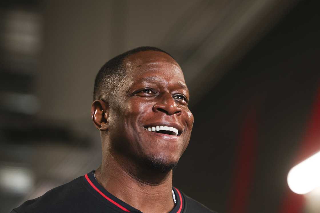 Raheem Morris of the Atlanta Falcons walks out for warmups before an NFL football game