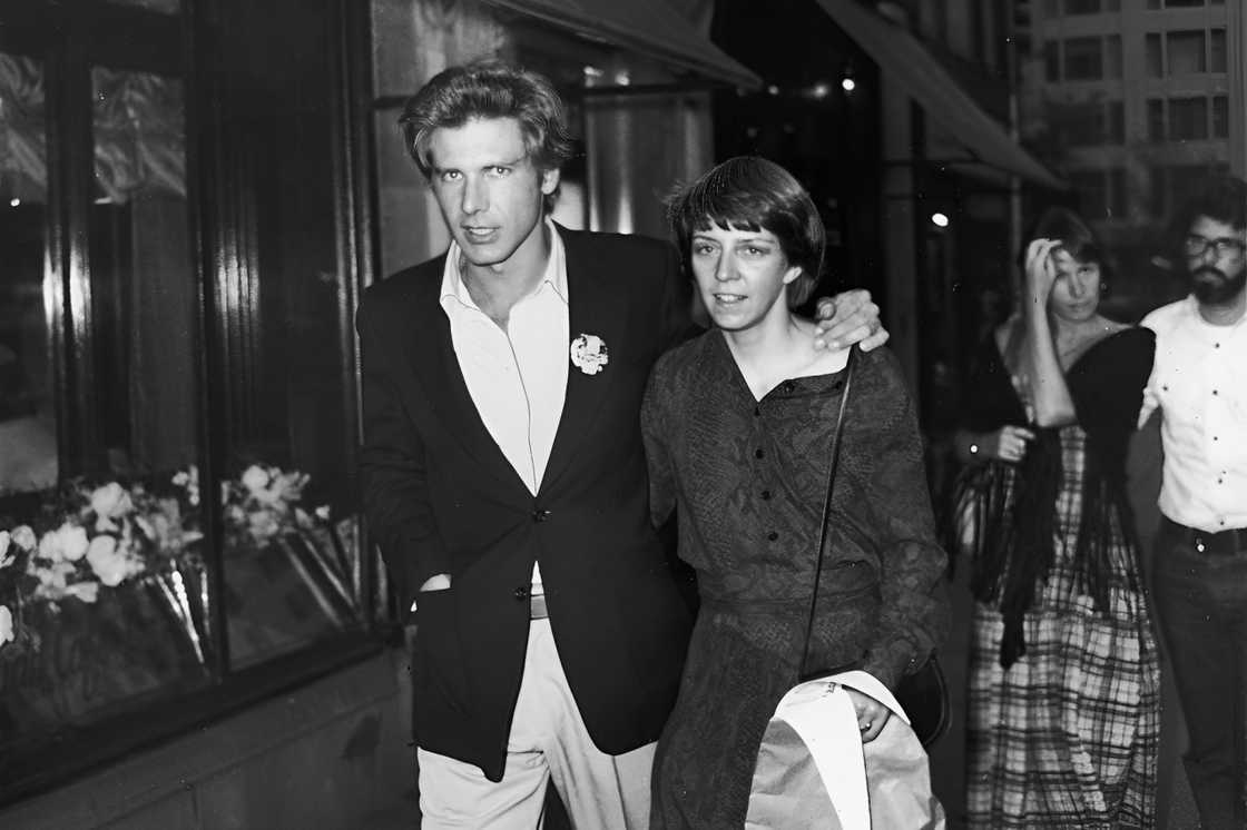 Harrison Ford (L) and wife, Mary Marquardt (R), walking in New York City Harrison Ford (L) and wife, Mary Marquardt (R), walking in New York City