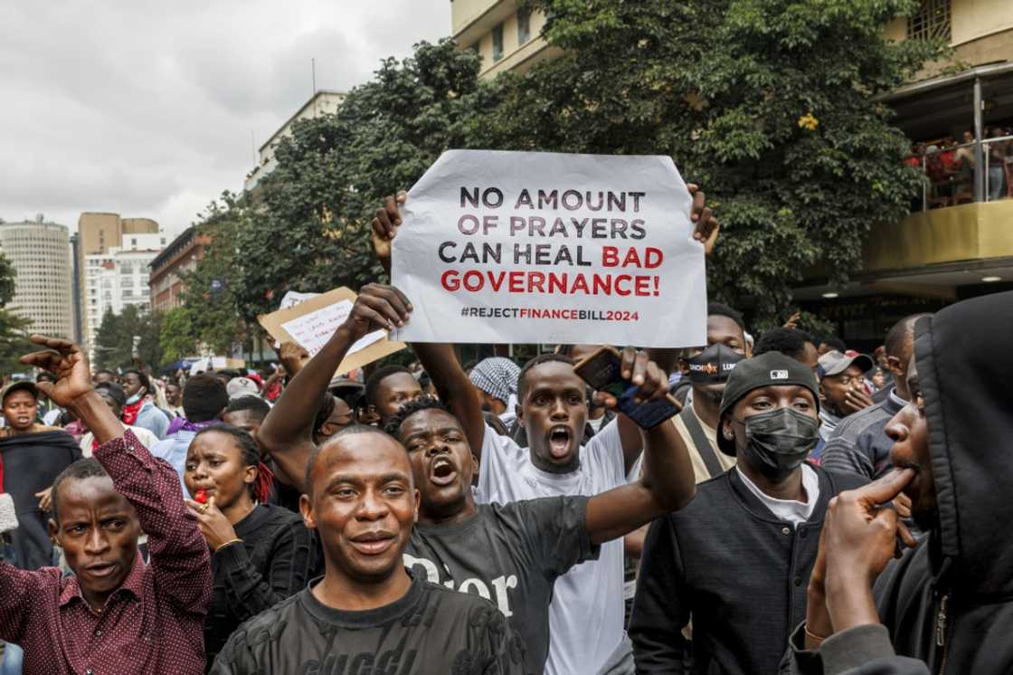 Armed with smartphones to livestream their protests, the demonstrators have won fans online with their witty signs Armed with smartphones to livestream their protests, the demonstrators have won fans online with their witty signs