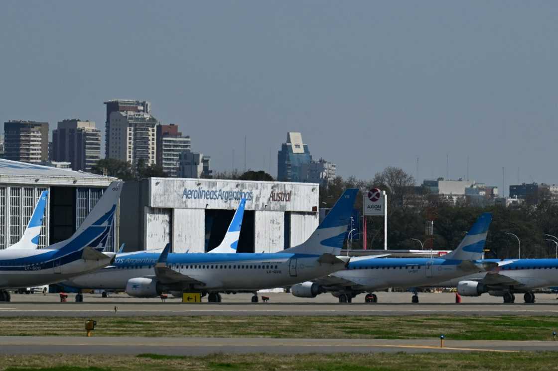 Aerolineas Argentinas airplanes are pictured on the tarmac Aerolineas Argentinas airplanes are pictured on the tarmac