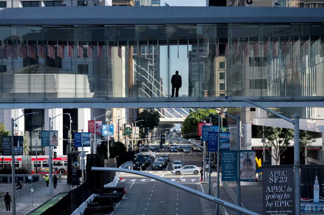 Security personnel stand on a walkway at the Moscone Center, during the first day of the Asia-Pacific Economic Cooperation (APEC) Leaders' Meeting in San Francisco, California, on November 11, 2023