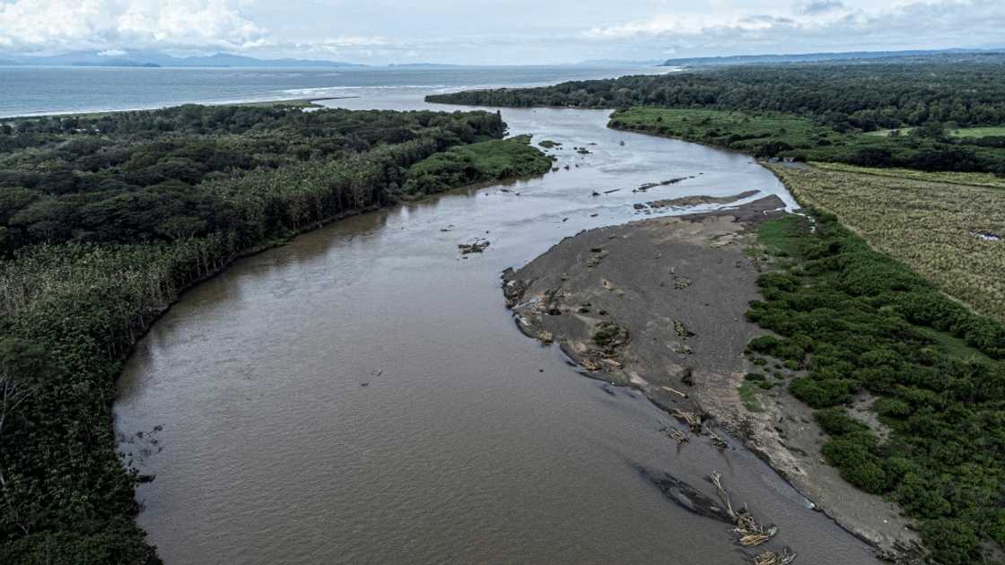 View of the Tarcoles River, one of the most polluted in Central America, as it flows into the Pacific Ocean. View of the Tarcoles River, one of the most polluted in Central America, as it flows into the Pacific Ocean.