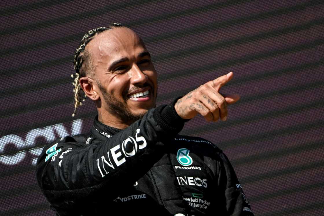 British Formula One driver Lewis Hamilton was named as an investor in the new ownership group of the NFL's Denver Broncos British Formula One driver Lewis Hamilton was named as an investor in the new ownership group of the NFL's Denver Broncos