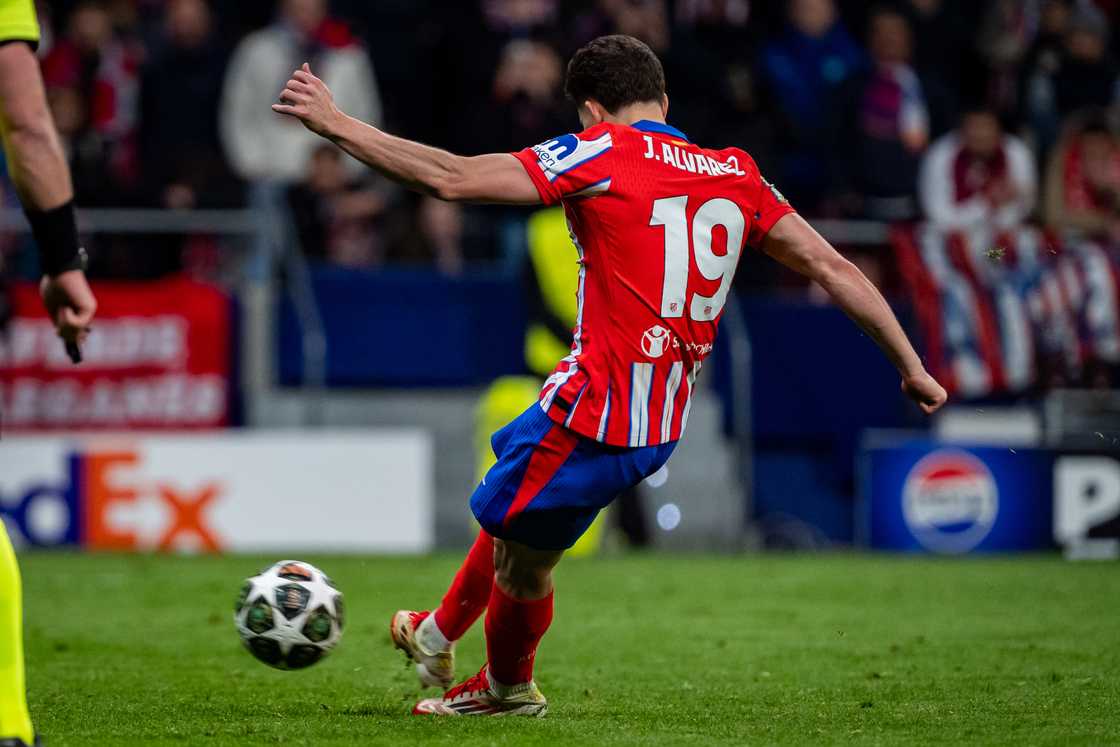 Julian Alvarez of Atletico de Madrid seen kicking the penalty was later disallowed during the UEFA Champions League 2024/25 Round of 16 second leg match between Atletico de Madrid and Real Madrid on March 12, 2025 in Madrid, Spain Julian Alvarez of Atletico de Madrid seen kicking the penalty was later disallowed during the UEFA Champions League 2024/25 Round of 16 second leg match between Atletico de Madrid and Real Madrid on March 12, 2025 in Madrid, Spain