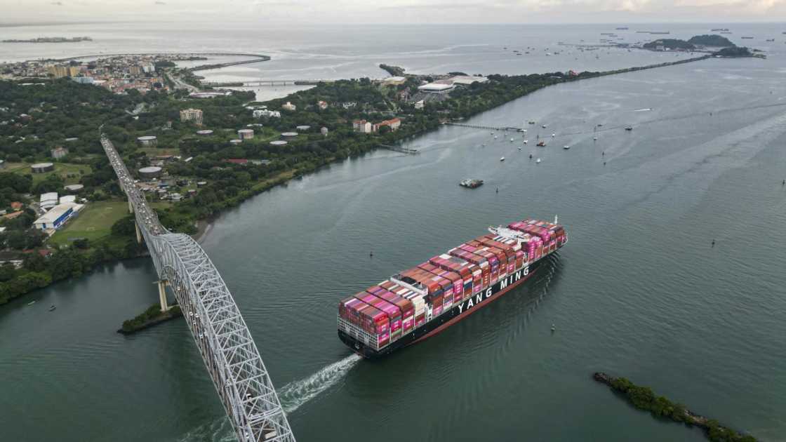 A Taiwanese cargo ship sails out of the Panama Canal on the Pacific side