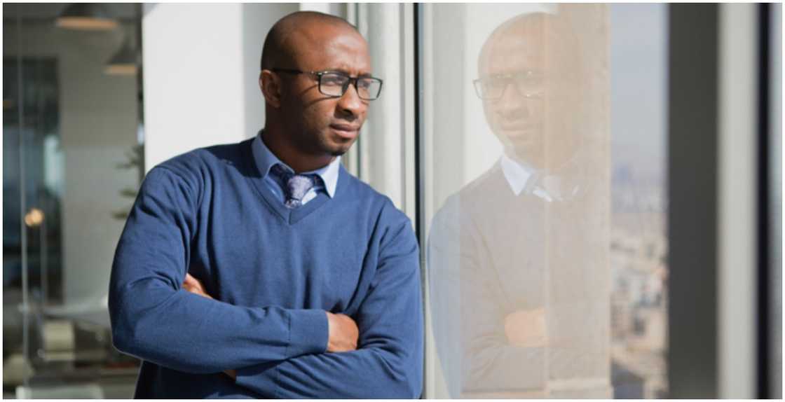 Man Thinking Of What To Do With His Boss After Finding Video Of His Office Affair Man Thinking Of What To Do With His Boss After Finding Video Of His Office Affair
