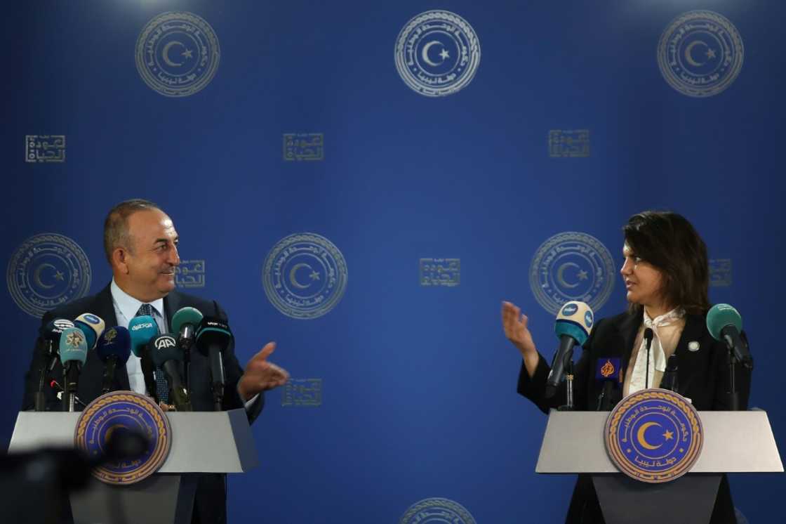 Libyan Foreign Minister Najla al-Mangoush and Turkish Foreign Minister Mevlut Cavusoglu speak to reporters after s signing a maritime gas deal Libyan Foreign Minister Najla al-Mangoush and Turkish Foreign Minister Mevlut Cavusoglu speak to reporters after s signing a maritime gas deal