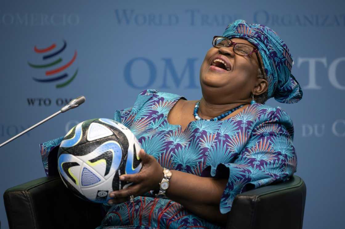 Ngozi Okonjo-Iweala with a 2023 FIFA Women's World Cup official football