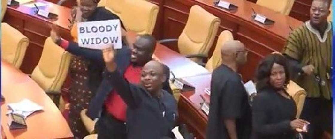 NDC MPs who held 'bloody widow' placards can not be identified - Parliament NDC MPs who held 'bloody widow' placards can not be identified - Parliament