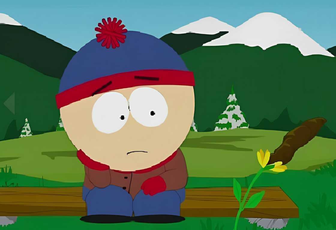 Stan Marsh sits on a wooden bench Stan Marsh sits on a wooden bench