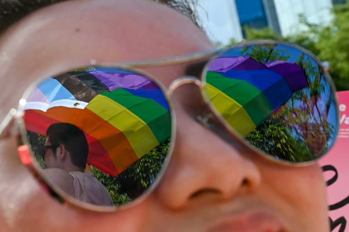 Supporters of LGBTQ rights attend the annual "Pink Dot" event at Hong Lim Park in Singapore Supporters of LGBTQ rights attend the annual "Pink Dot" event at Hong Lim Park in Singapore
