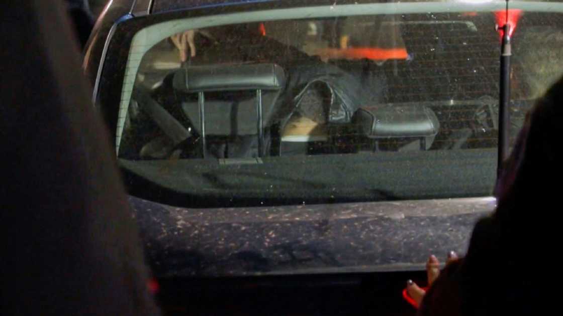 A video grab taken from AFPTV on September 1, 2022, shows a man who attempted to shoot Argentine Vice-President Cristina Kirchner being held in a police vehicle -- local media later reported that his companion was also arrested A video grab taken from AFPTV on September 1, 2022, shows a man who attempted to shoot Argentine Vice-President Cristina Kirchner being held in a police vehicle -- local media later reported that his companion was also arrested