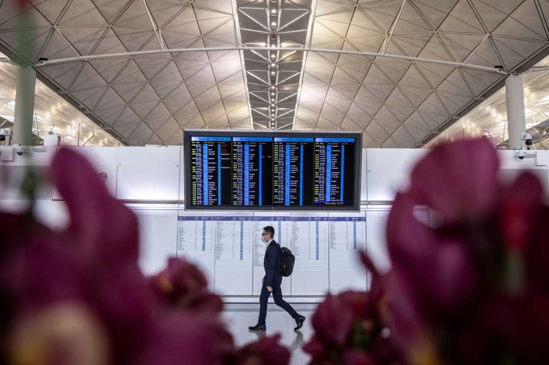 Airlines are struggling to ramp up flights to Hong Kong because of staff shortages at the airport