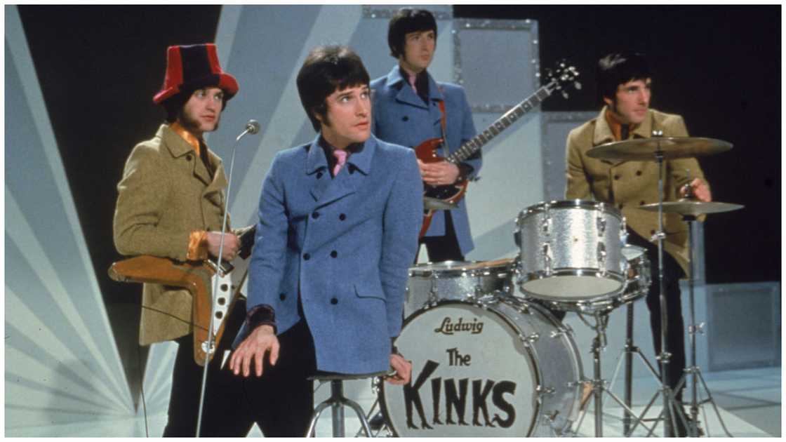 The Kinks posing with musical instruments The Kinks posing with musical instruments