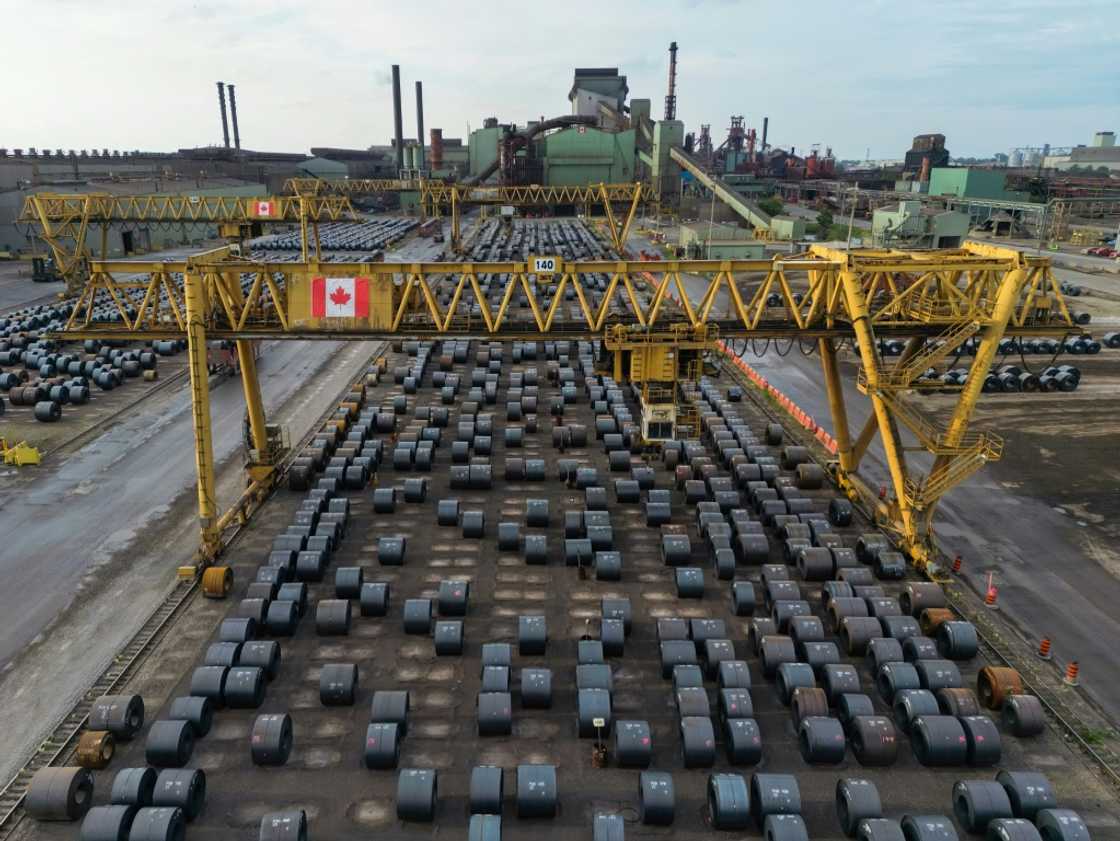 Steel coils sitting in the yard at ArcelorMittal Dofasco's steel mill in Hamilton, Canada, which now face 50 percent tariffs to enter the United States Steel coils sitting in the yard at ArcelorMittal Dofasco's steel mill in Hamilton, Canada, which now face 50 percent tariffs to enter the United States