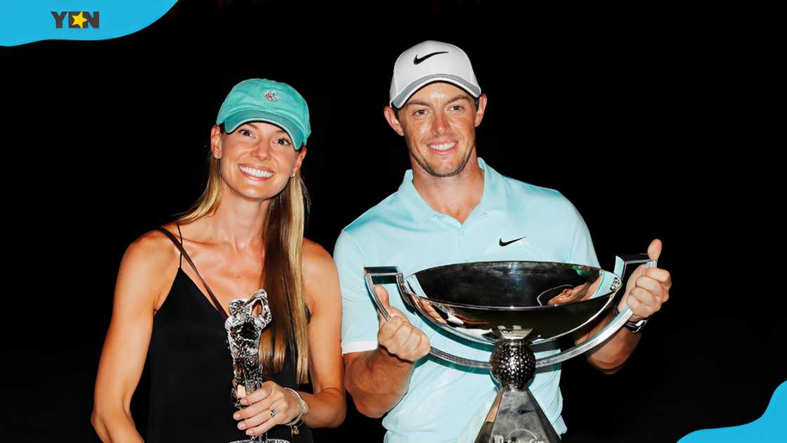 Rory McIlroy (R) poses alongside Erica Stoll (L) Rory McIlroy (R) poses alongside Erica Stoll (L)