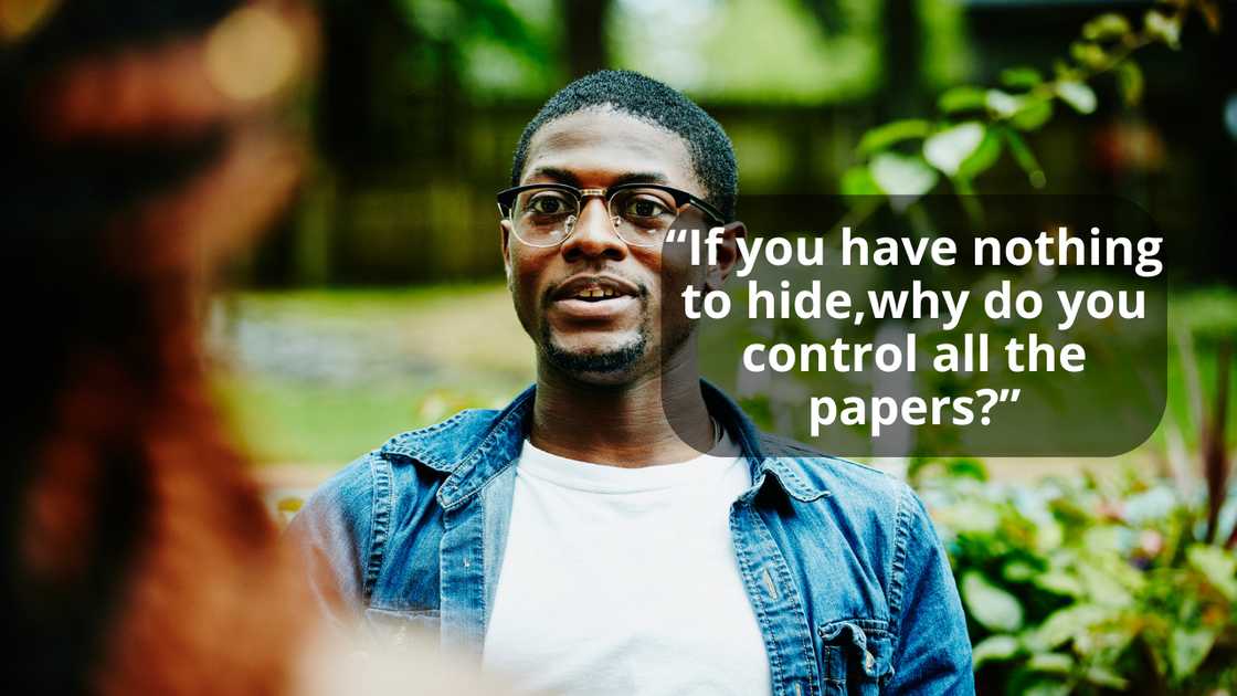 A man addresses his step nrother during a community meeting A man addresses his step nrother during a community meeting