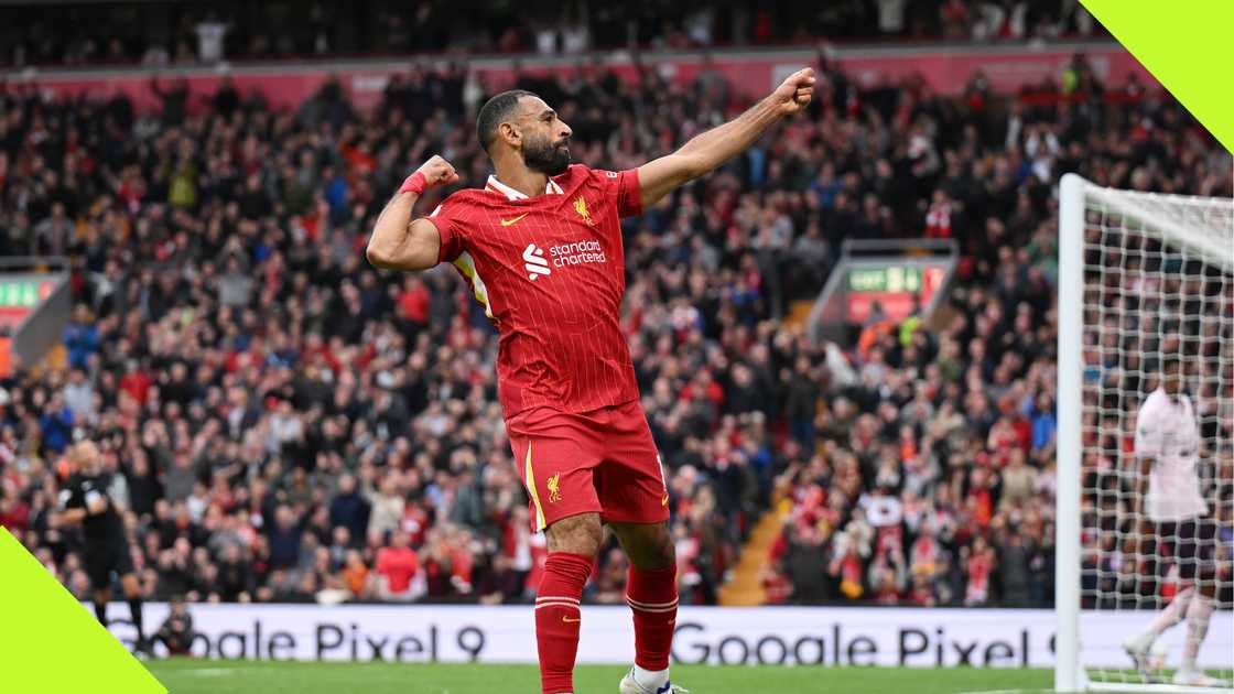 Mohamed Salah celebrates after scoring for Liverpool against Brentford.