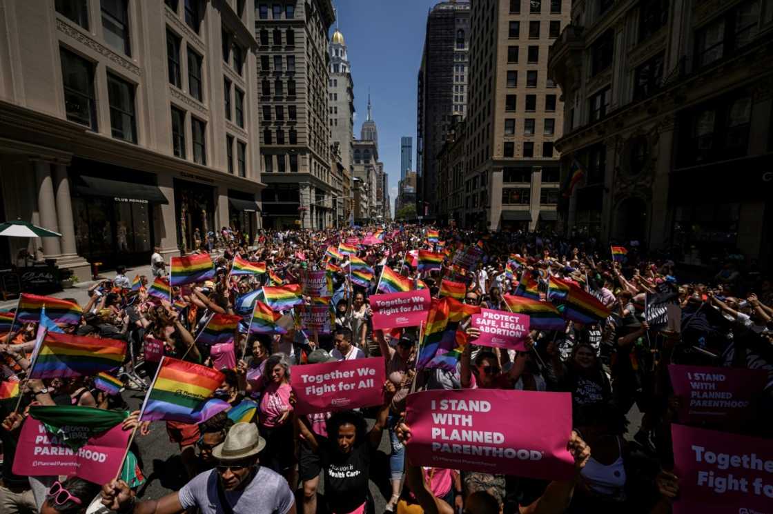 Participants marched through lower Manhattan in the blazing sunshine during the march, the first time it has been held since the pandemic began