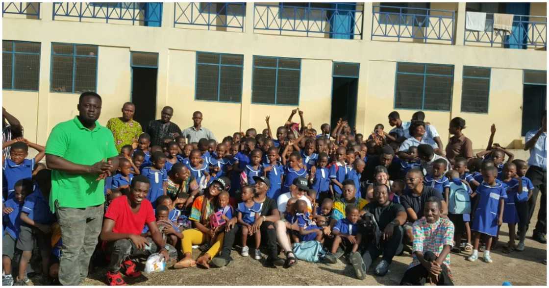 Fuse ODG poses with students at his orphanage school Fuse ODG poses with students at his orphanage school
