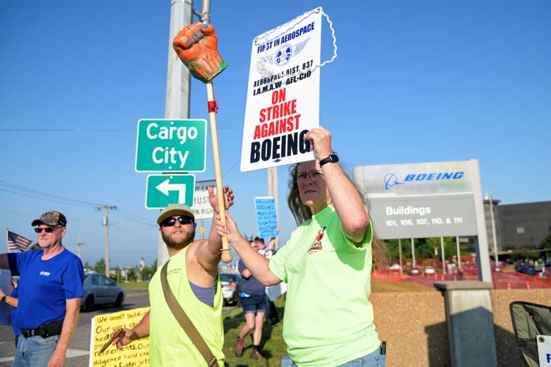 Defense plant workers take part in a strike outside a Boeing facility in Berkeley, Missouri, near St. Louis, on August 5, 2025.