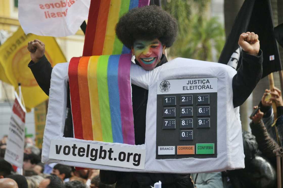 Some were dressed as electronic voting machines, whose exclusive use Bolsonaro claims makes cheating easier Some were dressed as electronic voting machines, whose exclusive use Bolsonaro claims makes cheating easier