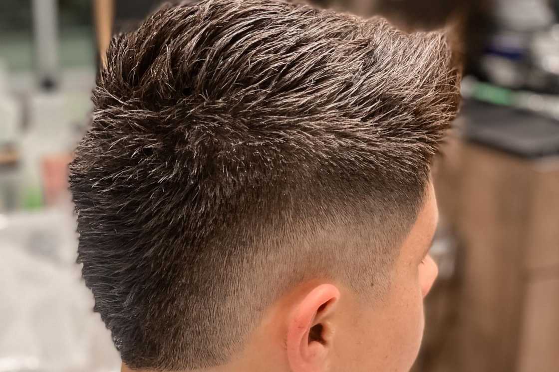 A side view of a faux hawk hairstyle