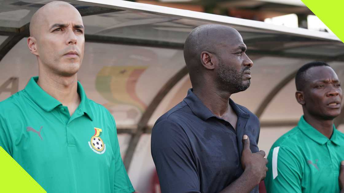 Otto Addo, flanked by his assistants stand during Ghana's national anthem ahead of the Sudan clash in Accra.