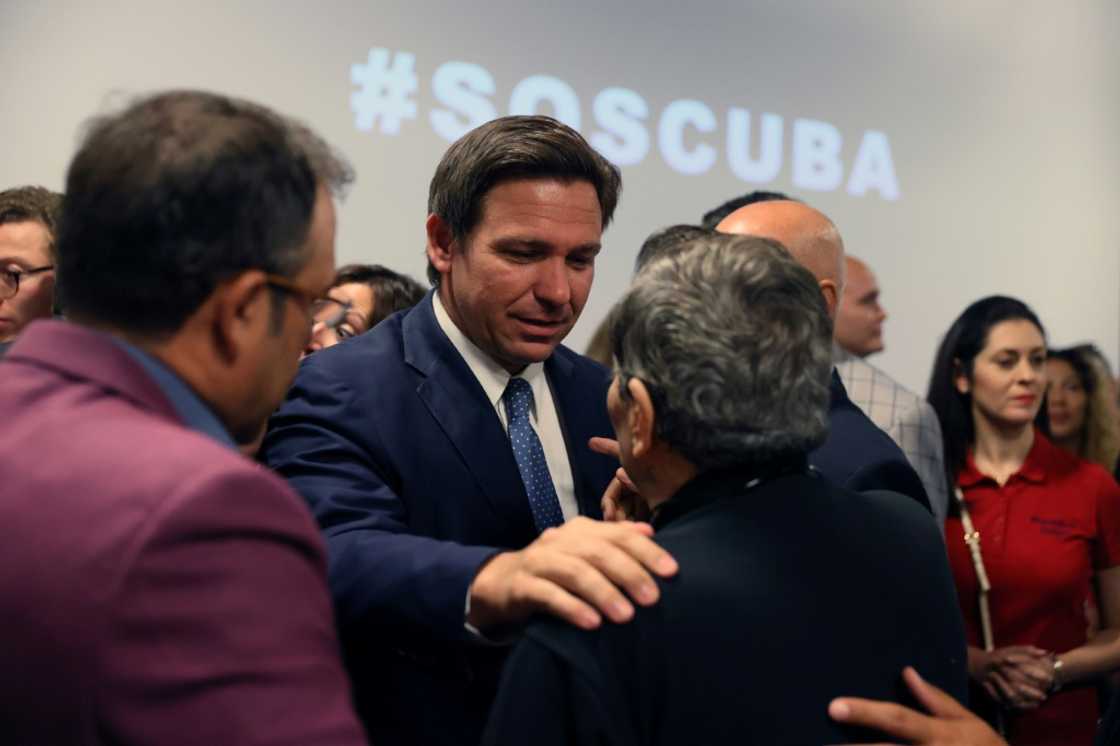 Governor Ron DeSantis of Florida greets people after holding a roundtable discussion at the American Museum of the Cuba Diaspora in Miami in July 2021 Governor Ron DeSantis of Florida greets people after holding a roundtable discussion at the American Museum of the Cuba Diaspora in Miami in July 2021