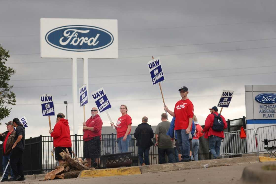 UAW workers, shown picketing outside of Ford's Wayne Assembly Plant last month, are returning to work after the company announced a tentative agreement with the United Auto Workers union UAW workers, shown picketing outside of Ford's Wayne Assembly Plant last month, are returning to work after the company announced a tentative agreement with the United Auto Workers union