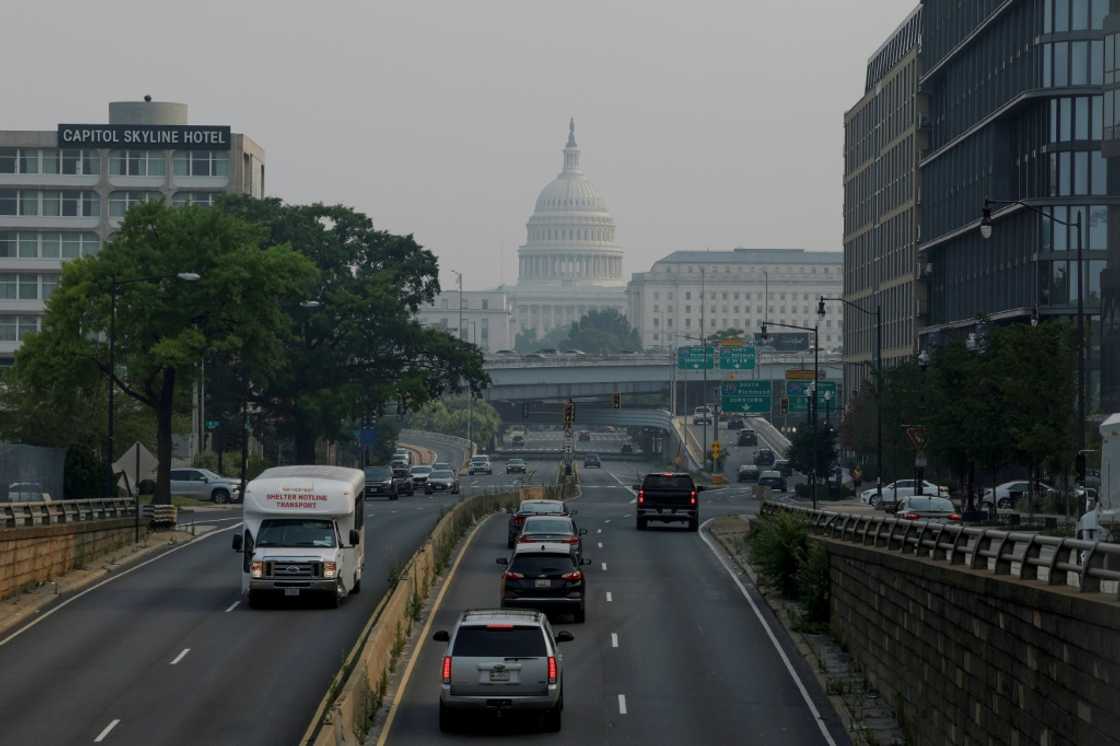 JUNE 29: Cars drive in hazy smoke on South Capitol Street towards the U.S. Capitol Building on June 29, 2023 in Washington, DC JUNE 29: Cars drive in hazy smoke on South Capitol Street towards the U.S. Capitol Building on June 29, 2023 in Washington, DC