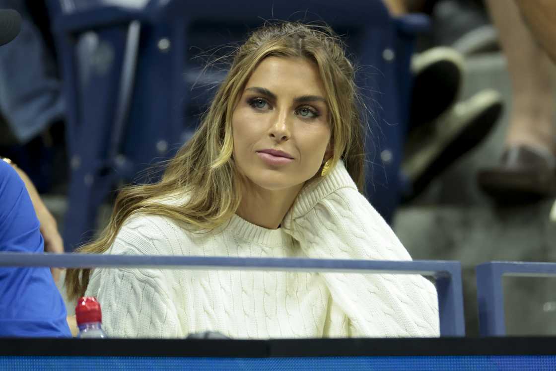 Paige Lorenze cheers for Tommy Paul of the USA Paige Lorenze cheers for Tommy Paul of the USA