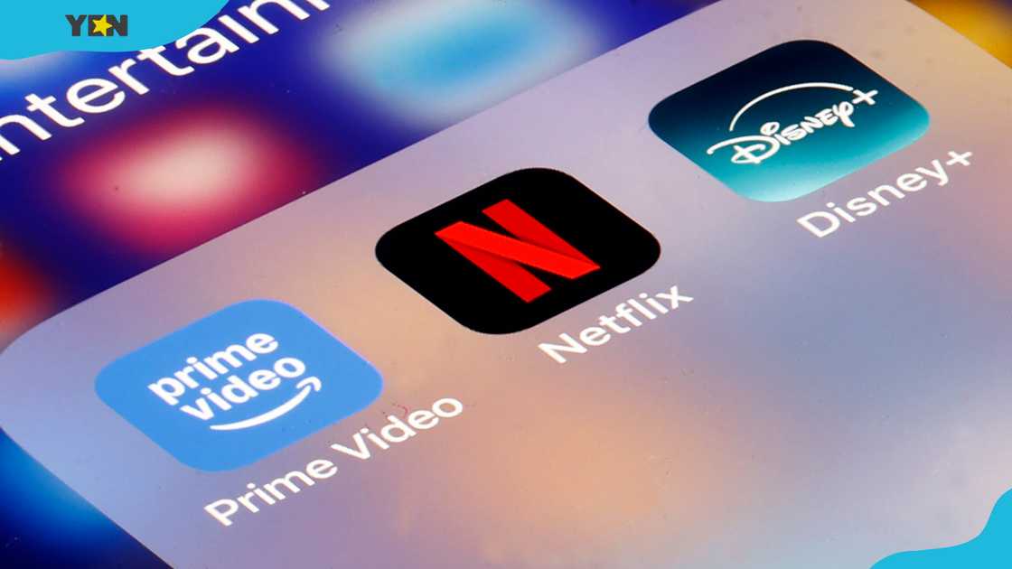 Prime Video, Netflix and Disney+ media service providers' logos on the screen of a phone. Prime Video, Netflix and Disney+ media service providers' logos on the screen of a phone.
