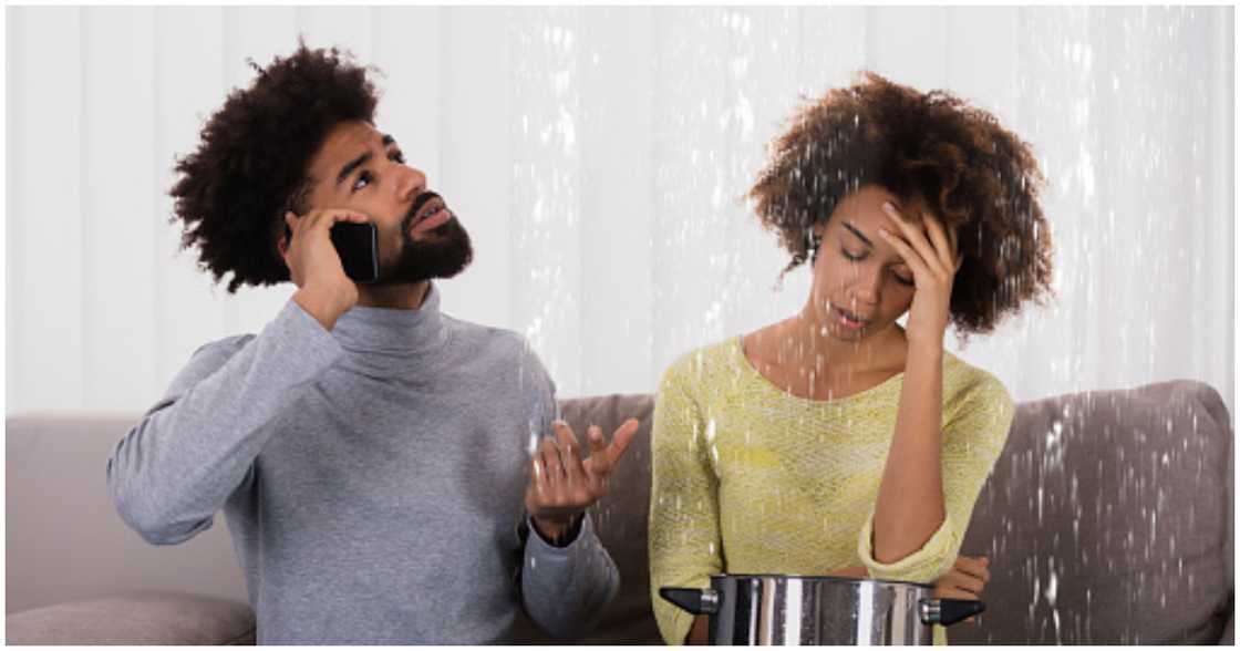 A couple experiences leakages in their home A couple experiences leakages in their home