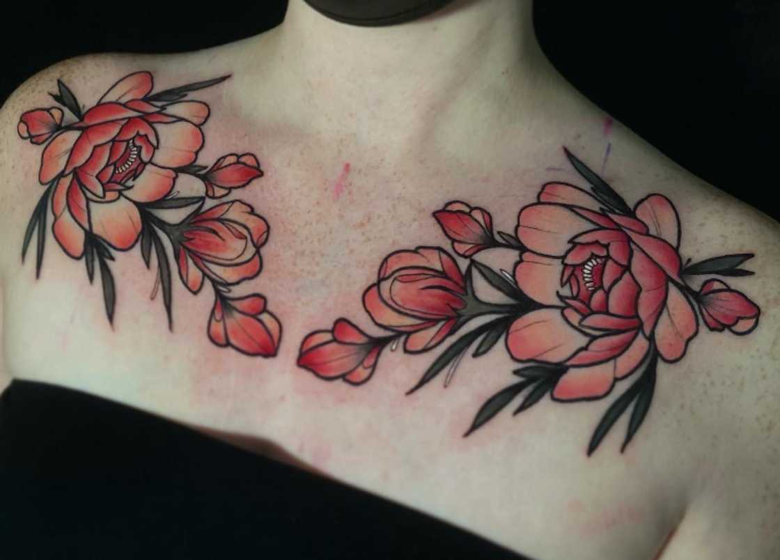 Blooming flowers collarbone tattoo