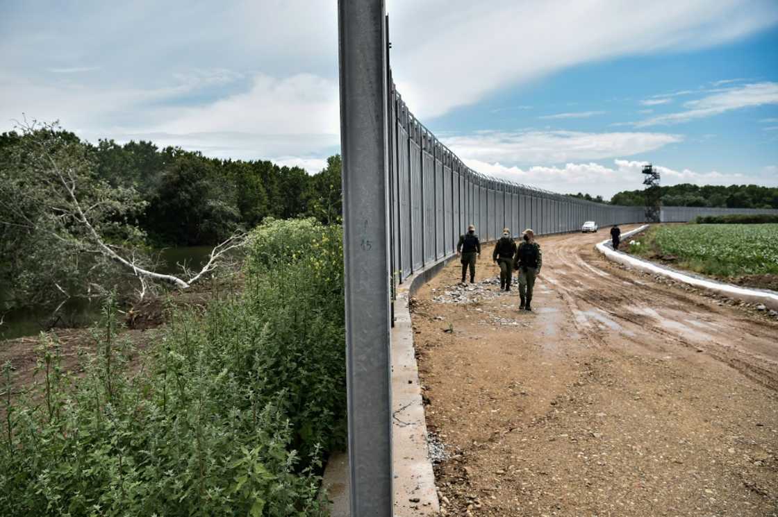 Part of that strategy involves extending an existing 40-kilometre (25-mile) wall on the Turkish border in the Evros region by 80 kilometres Part of that strategy involves extending an existing 40-kilometre (25-mile) wall on the Turkish border in the Evros region by 80 kilometres
