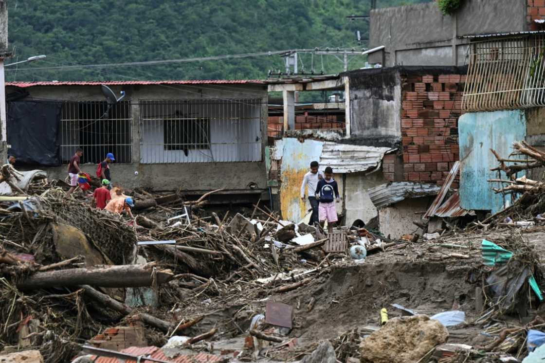 Around a thousand people joined the rescue efforts in Las Tejerias, Venezuela to search for victims stuck in the rubble after a landslide due to heavy rains October 9, 2022 Around a thousand people joined the rescue efforts in Las Tejerias, Venezuela to search for victims stuck in the rubble after a landslide due to heavy rains October 9, 2022